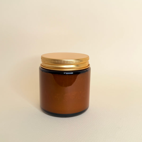Frasco de vidrio ámbar/ tapa dorada 100 ml