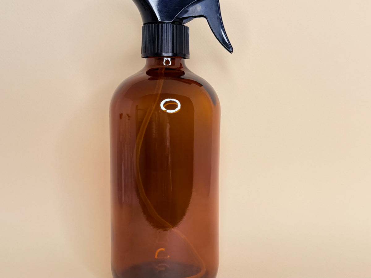 Envase de vidrio ámbar 500 ML con gatillo negro