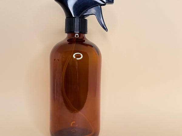 Envase de vidrio ámbar 500 ML con gatillo negro
