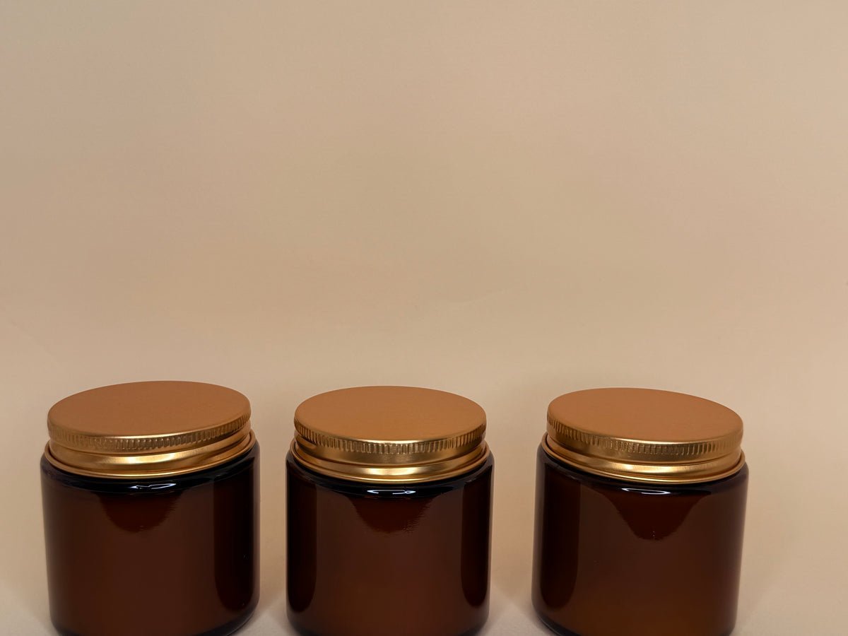 Frasco de vidrio ámbar/ tapa dorada 100 ml